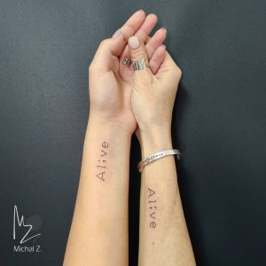 mom and daughter matching tattoos