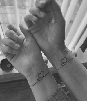 mother daughter heart tattoos