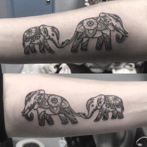 mother daughter matching elephant tattoos